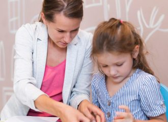 medium-shot-girl-teacher-gluing-paper_23-2148673117